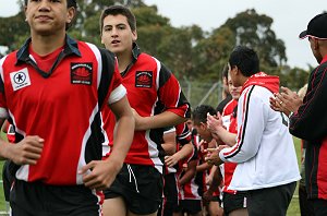 Endeavour opens team form a tunnel for their Buckley Shield team mates 