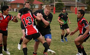 Illawarra's big forward charges to the line and ....