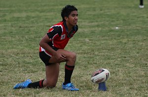 Damien lines up for the kick at goal 