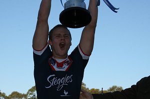 Jacob Miller holds up the 2010 SG Ball Cup