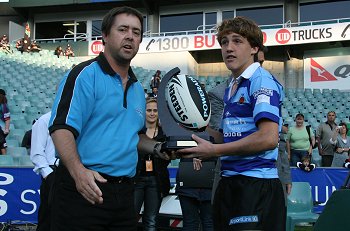 The COKE MAN presents the 2010 COCA COLA CUP to Jets Skipper Jaiden Brown At SFS (Photo's : Steve Montgomery / OurFootyTeam.com) 