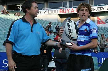 The COKE MAN presents the 2010 COCA COLA CUP to Jets Skipper Jaiden Brown At SFS (Photo : ourfootymedia) 