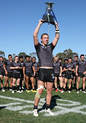 Panthers Captain Bryce Cartwright hold up the Harold Matthews Cup (Photo's : Steve Montgomery / OurFootyTeam.com) 