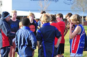 Kildare Catholic College under 13 coach Matt Conn speaks to his team at their final training session on Monday. Pictures: Kieren L Tilly