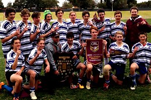 Holy Trinity team after winning the Under 16 Small Schools final against Sacred Heart Cootamundra at Dubbo yesterday (back from left) Brady Mather, Joe Smith, Noah Mallory, Will Hamilton, Mikey Cashel, Alex Ticehurst, Luke Gilligan, Jaidon Tasker, Toby Hawkins, coach Peter Ehsman (front from left) Zac Nedianu, Josh Fox, Will McAuliffe, Nik House, Lachlan Conley, Adam Marquart, Jack McAuliffe.