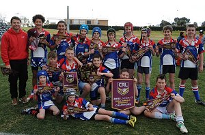 Tumut's McAuley Central School celebrate their victory in the under 13 Small Schools Final at Dubbo on Wednesday. Picture: Belinda Soole