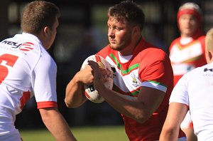 Rhys Davies charges into the England LIONS defence (Photo : IanLovell.com) 
