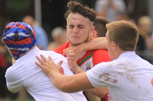 The England defence smash Wales' Harry Bevan (Photo : IanLovell.com) 