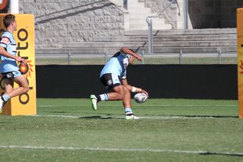 Semisi Kioa puts the ball down under the black dot after his sweet 40 meter run to the line (Photo : steve montgomery / OurFootyTeam.com) 