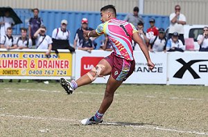 Connelly Lemuelu kicks the winning field goal for Keebra Park State High. Picture: Glenn Hampson