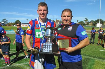 Josh Schuster Newcastle Knights Skipper proudly holding the 2017 Harold Matthews Cup (Photo : Steve Montgomery / OurFootyTeam.com) 