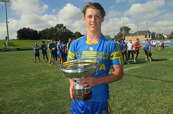 Eels Captain Kyle Schneider proudly holding the 2017 National u18 Club Championship Cup (Photo : steve montgomery / OurFootyTeam.com) 
