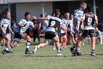 Sharks HMC Hooker Jared Domazetovski unloads to a flying Douglas Levi in Round 8 (Photo : Steve Montgomery / OurFootyTeam.com) 