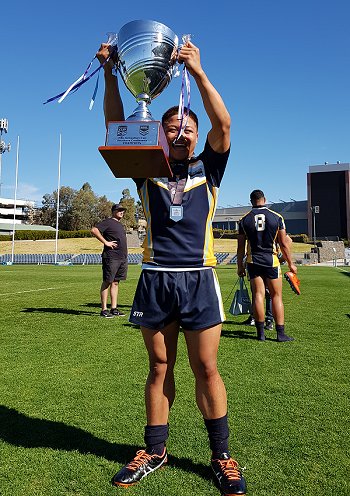 Gordon Chan Westfields SHS Captain proudly holds up the 2019 Southern Conference Cup of the National Schoolboy Cup (Photo : Steve Montgomery / OurFootyTeam.com)