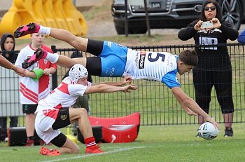 Italy's Luca Faraguna dives in for a spectactular try in Saturday's U16s Test v Malta (Photo : Steve Montgomery / OurFootyTeam.com)