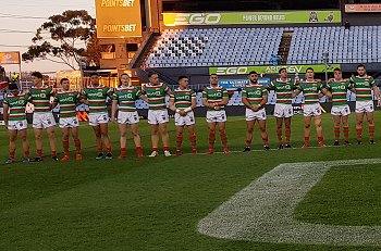 South Sydney Rabbitohs line up in honour of John Chalk (Photo : Steve Montgomery / OurFootyTeam.com)