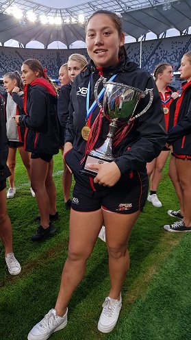 Maddi Weatherall has a tight grip on the Tarsha Gale Cup (Photo : steve montgomery / OurFootyTeam.com)