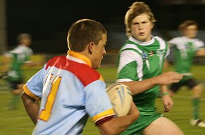 Dion runs past a serious looking Jack - De la Salle Vs Gymea Gorilla's Rnd 3 at Shark Park ( Photo : ourfooty media)