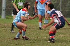 Nick Pleasence looks for a way thru' the Menai line - Menai Roosters Vs De la Salle U 15A's (Photo : ourfooty media)