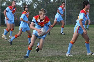 Daniel Small runs from dummy U15A's Roosters Vs De La Salle (Photo : ourfooty media)