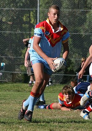 Luke Manahan runs on to a pass U15A's Roosters Vs De La Salle (Photo : ourfooty media)