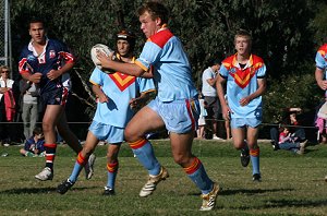 Zac Wederswelier runs up the middle - U15A's Roosters Vs De La Salle (Photo : ourfooty media)