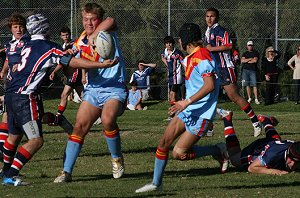 Zac with a great offload - U15A's Roosters Vs De La Salle (Photo : ourfooty media)