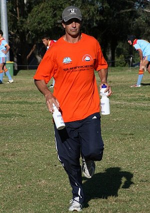 De La's water runner Mr. Wayne Clark at work - U15A's Roosters Vs De La Salle (Photo : ourfooty media)