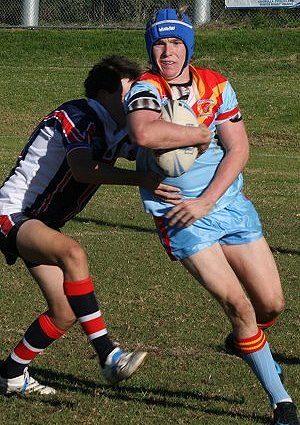 Nick the 'RAT' runs around the Menai defender - U15A's Roosters Vs De La Salle (Photo : ourfooty media)
