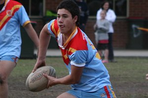Jesse Faye offloads - De La Salle v St. John's Bosco U16A's Rnd 8 aCTioN (Photo's : ourfooty media)