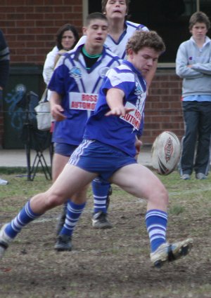 Gavan Beattie kicking the footy clear - De La Salle v St. John's Bosco U16A's Rnd 8 aCTioN (Photo's : ourfooty media)