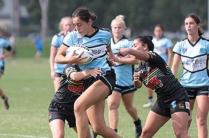 Cronulla's Tegan Dymock smashes through the Panthers line in Saturday's Elimination Final (Photo : Steve Montgomery / OurFootyTeam.com)