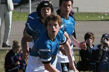 Micheal clears the ball for the Sharks 