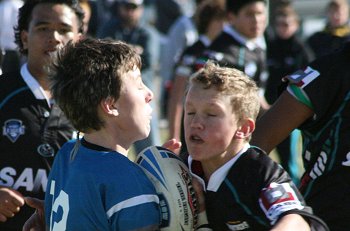 Micheal clears the ball for the Sharks 