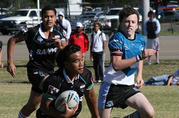 Micheal clears the ball for the Sharks 