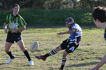 Cameron Paddy kicks for goal