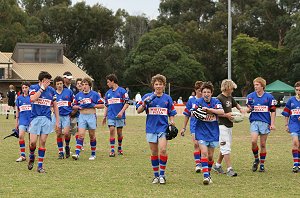 The Dragons walk of Sutho Oval with a close fought win