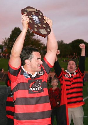 Captain Luke Grant shares the spoils’ [the Frank Hyde Shield] with the crowd. PHOTO: Steve Little.