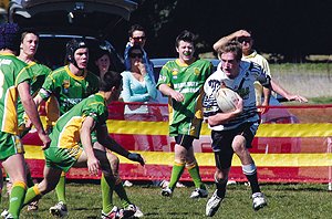 Lee McClintock looks for room to move during his side’s 24-18 loss to Orange CYMS in the major semi-final yesterday. Several chances went begging for the previously undefeated Magpies