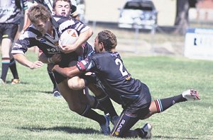 Forbes junior Lou Goodwin attempts to break the Bathurst Panthers defence on Saturday.