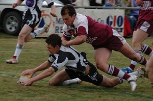 Michael Adams crosses the line against Inverell on Sunday.