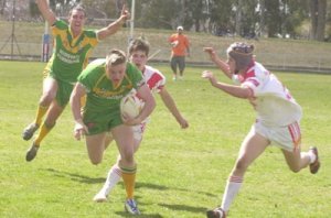 Will Ostini dives over to score a try for CYMS