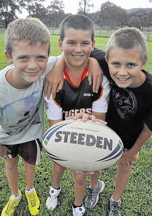 Junior Denman Devils under 12 and 13 players Cooper Dever, 11, Jayden Parker, 12, and Alec Duncan, 13. 