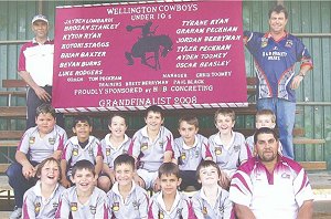 Trainers Chris Toomey, Brett Berryman and coach Tom Peckham with the under 10 Cowboys preparing to face the grand final this weekend.