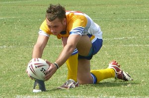 Ryan Miller about to convert his own try for Sunshine Coast