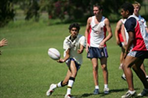 Anthony Raymond fires a pass away during a training session with the CQ under-17 team.