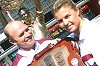 Wally Lewis presents an award at the 2006 Women in League presentaion night