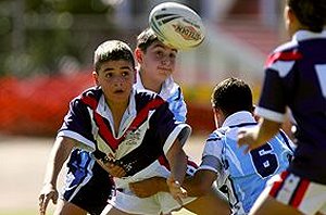 Kingsgrove Colts player slips a pass in the final against Riverwood Legion. Picture: Chris Lane