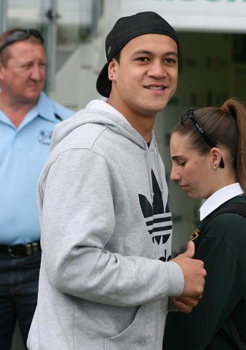 Chase Stanley watches his old school Endeavour SHS play the Ini Shield Grand Final (Photo : ourfootymedia)