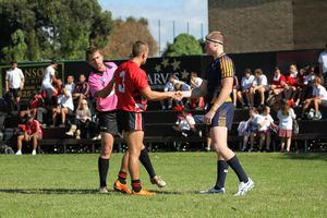 Referee Aaron Moller talks to the 2 captains b4 the Uni Shield clash (Photo's : OurFootyMedia) 